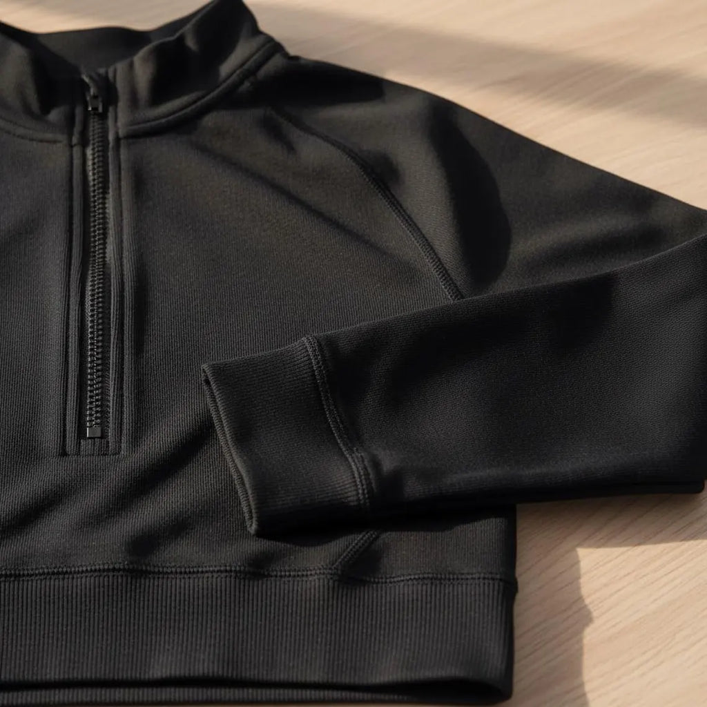 Black Athletic Set with Zippered Top and Fitted Shorts for Active Wear and Fitness Enthusiasts