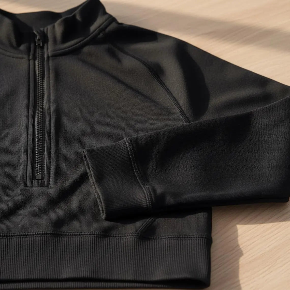 Black Athletic Set with Zippered Top and Fitted Shorts for Active Wear and Fitness Enthusiasts